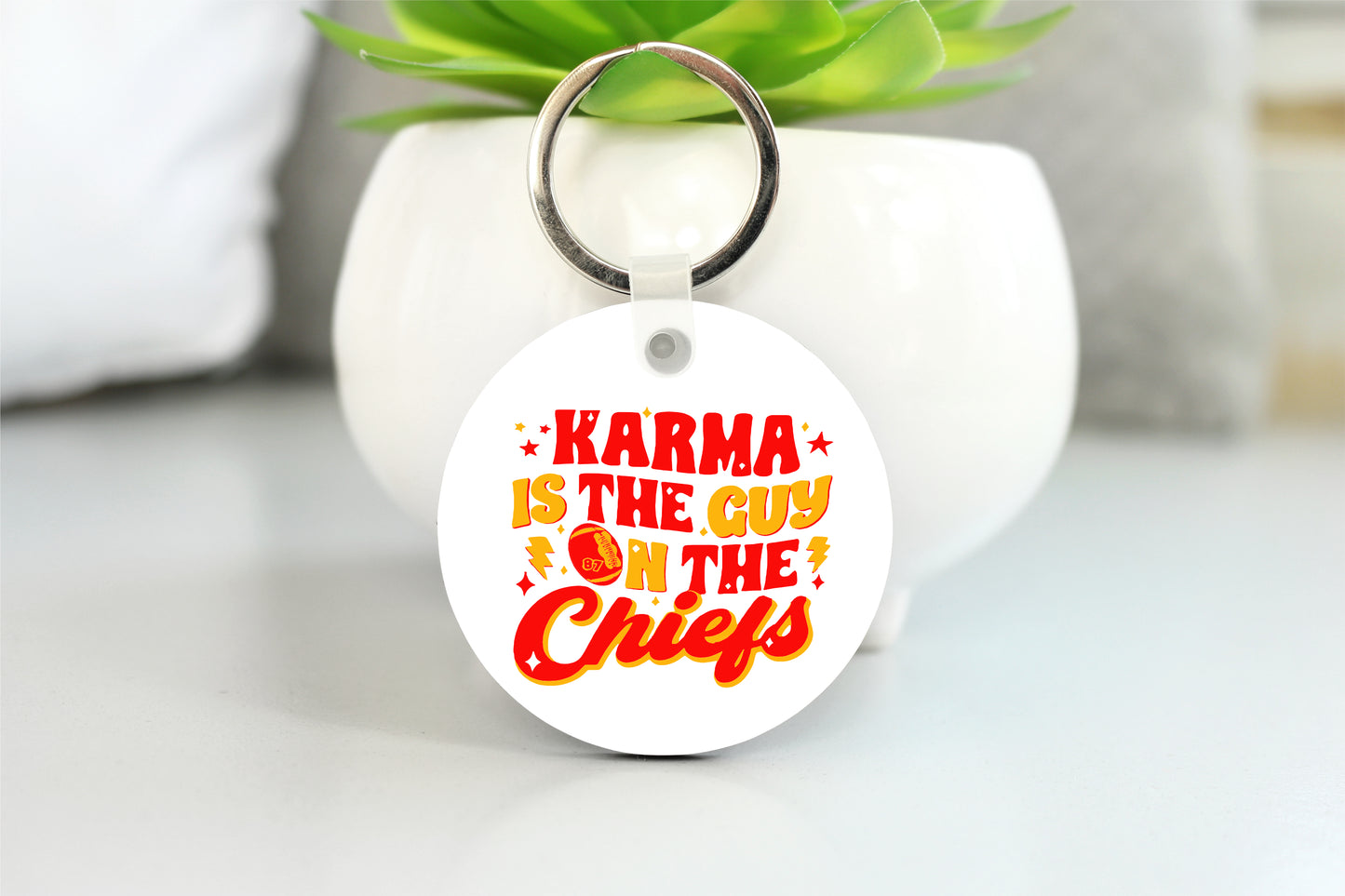 Karma is the Guy on the Chiefs Key chain